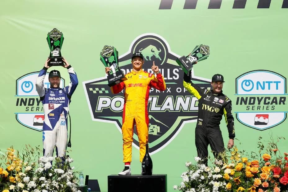 #60: Felix Rosenqvist, Meyer Shank Racing w/Curb Agajanian Honda, #10: Alex Palou, Chip Ganassi Racing Honda, #26: Will Power, Andretti Global Honda  on the podium