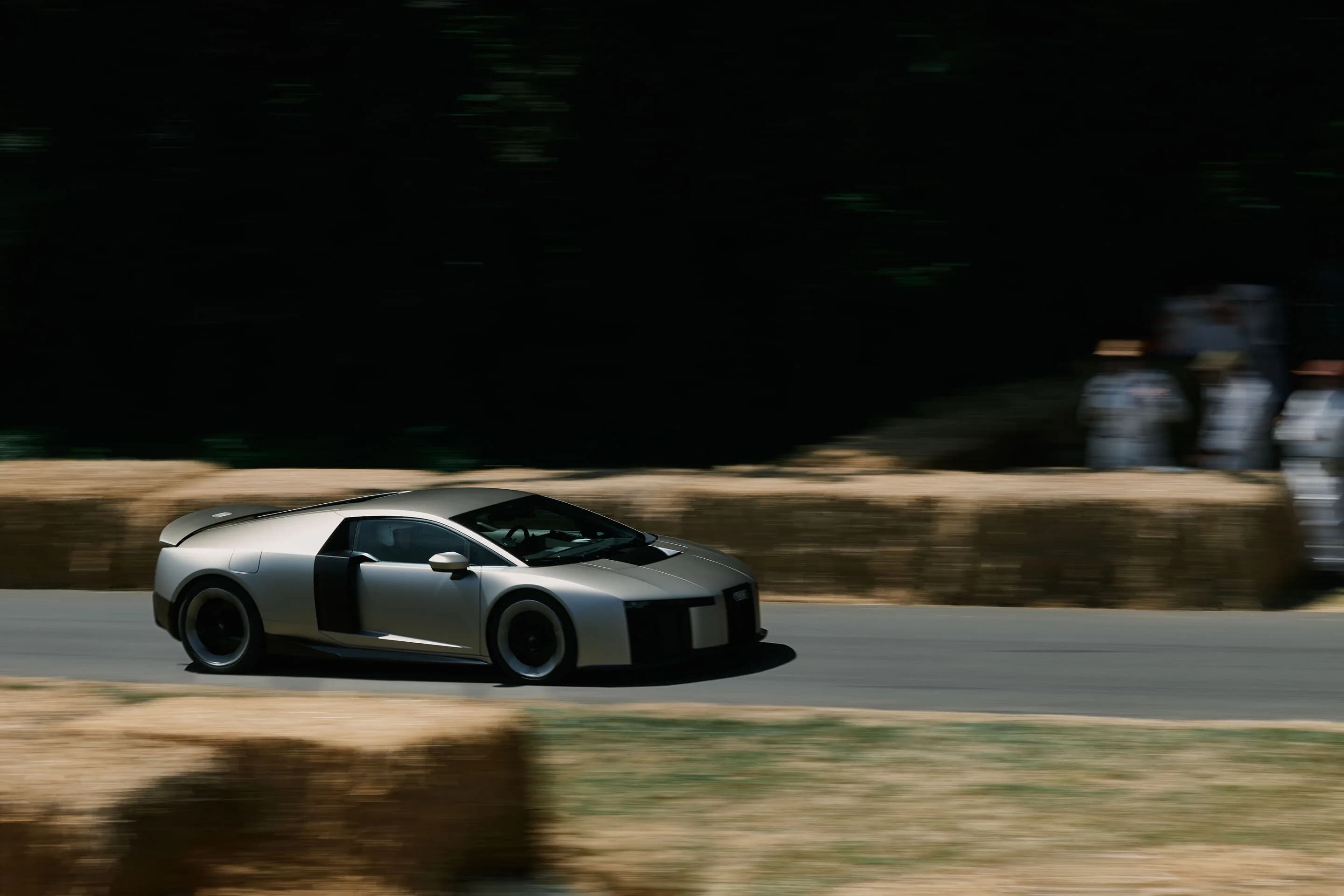 Audi Nuvolari at Goodwood Festival of Speed - Racing legend Tom Kristensen races Audi Nuvolari up the 1.86-kilometer Hillclimb in the grounds of Goodwood House. The Nuvolari is the fastest and most powerful production vehicle in the brand’s history —...
