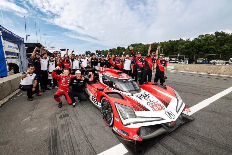 #93: Acura Meyer Shank Racing w/Curb Agajanian, Acura ARX-06, GTP: Renger van der Zande, Nick Yelloly and team celebrate their pole award with HRC President David Salters and HRC engineers