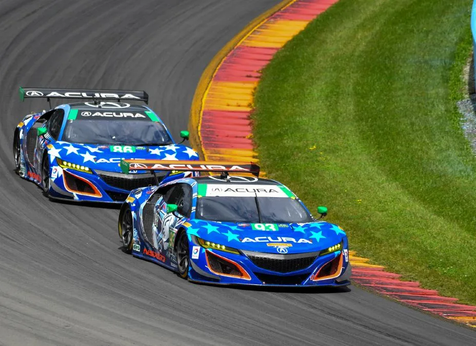 Both Michael Shank Racing Acura NSX GT3s featured patriotic liveries this weekend at Watkins Glen in recognition of Independence Day.  The winning #93 Acura of Andy Lally and Katherine Legge (in front) featured the Statue of Liberty, while the #86 NSX GT3 of Ozz Negri and Jeff Segal (here running in second late in the race) featured Uncle Sam.