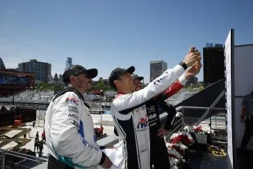 #10: Alex Palou, Chip Ganassi Racing Honda, #27: Kyle Kirkwood, Andretti Global Honda, #15: Graham Rahal, Rahal Letterman Lanigan Racing Honda celebrate on the podium
