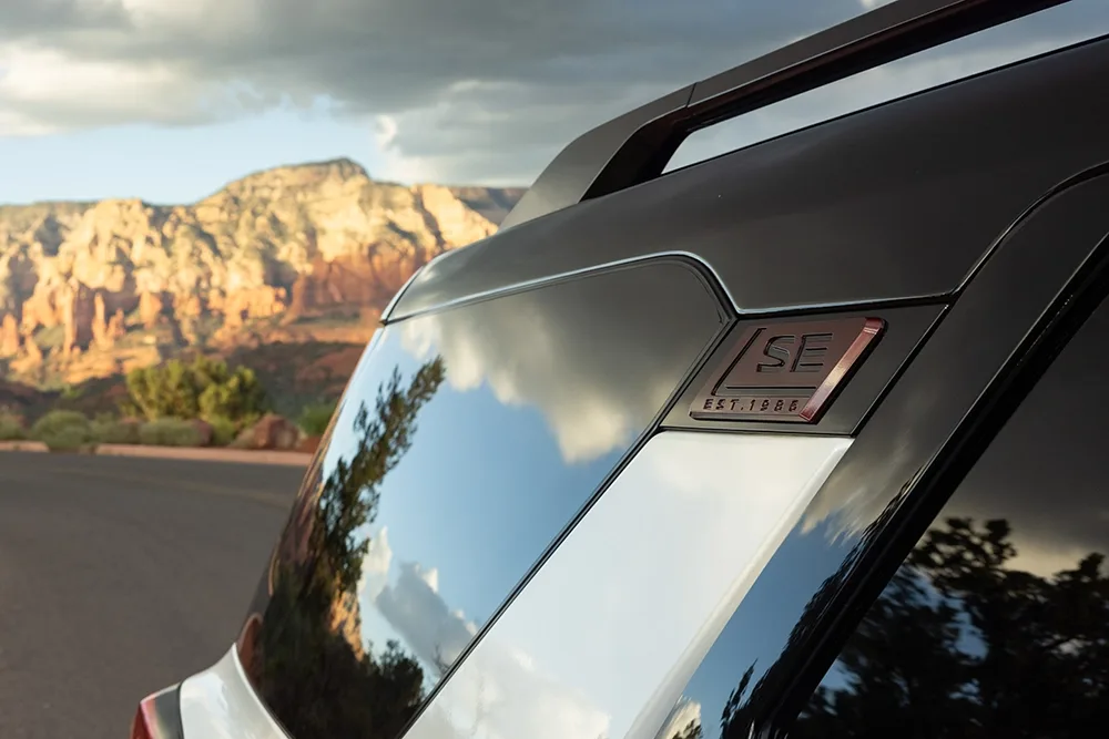 Close up of the SE badge on the