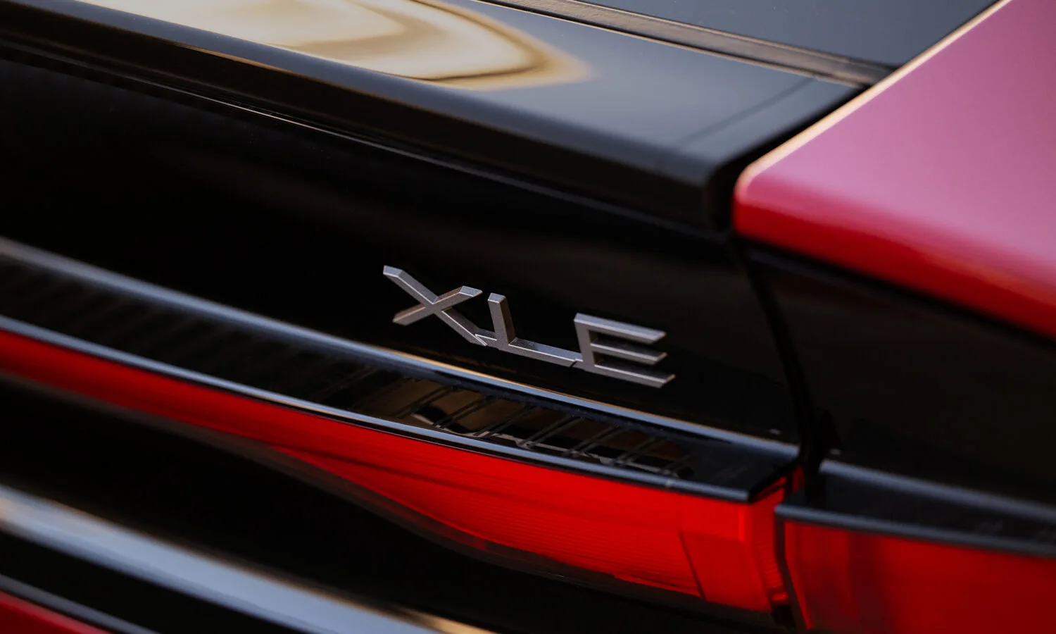 2027_Toyota_Prius_XLE_SuperSonicRed_008_NR