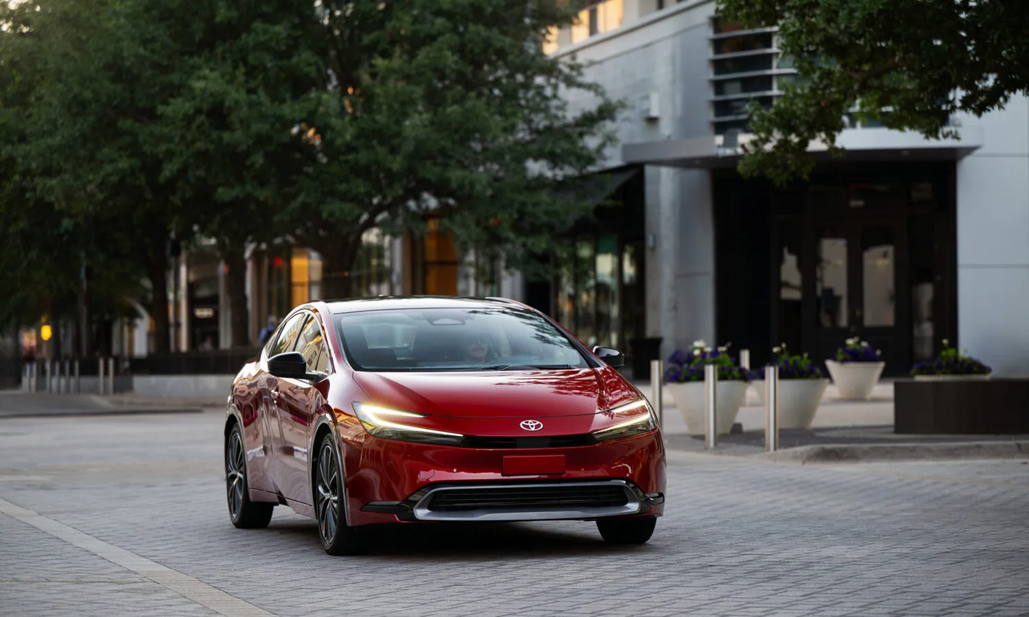 2027_Toyota_Prius_XLE_SuperSonicRed_002_NR